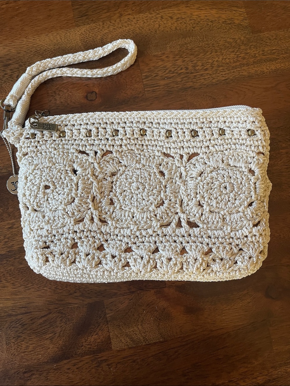 The Sak Cream Crochet Wristlet Clutch with Wrist Strap